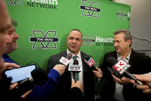 Marshall University's head football coach Tony Gibson responds to questions during a press conference on Thursday, Dec. 12, 2024, at the Brad D. Smith Center for Business and Innovation in Huntington, W.Va. (Ryan Fischer/The Herald-Dispatch via AP)