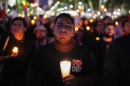 A unionized federal court worker protests against reforms that would make all judges stand for election in Mexico City, Monday, Aug. 26, 2024. (AP Photo/Eduardo Verdugo)