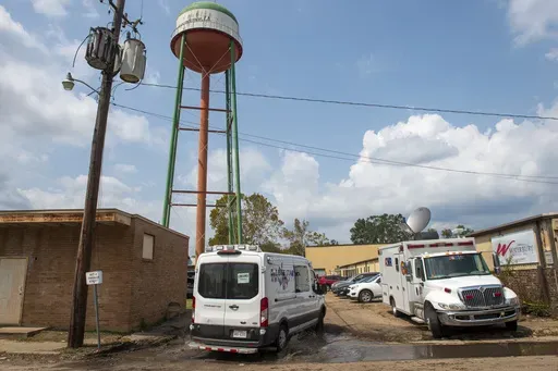 Emergency personnel arrive to evacuate people at a mass shelter, Sept. 2, 2021, in Independence, La. (Chris Granger/The New Orleans Advocate via AP, File)