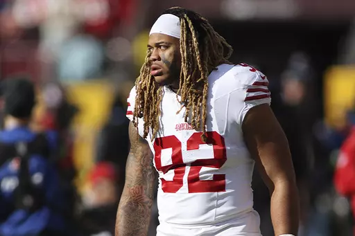San Francisco 49ers defensive end Chase Young looks on before an NFL football game against the Washington Commanders, Dec. 31, 2023, in Landover, Md. The New Orleans Saints have agreed to terms of a one-year contract with free agent Young. The contract agreement, announced Monday, March 18, 2024, by Saints general manager Mickey Loomis, provides reinforcements to an edge pass rush that often struggled to get pressure last season. (AP Photo/Daniel Kucin Jr., File)