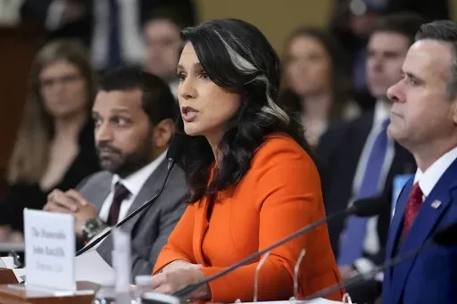 Director of National Intelligence Tulsi Gabbard, flanked by FBI Director Kash Patel, left, and CIA Director John Ratcliffe, testifies as the House Intelligence Committee holds a hearing on worldwide threats, at the Capitol, in Washington, Wednesday, March 26, 2025. (AP Photo/J. Scott Applewhite)