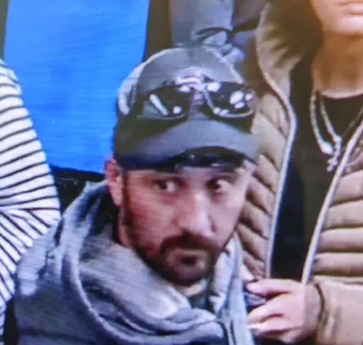 This airport surveillance camera image released in an FBI affidavit shows alleged suspect Marc Muffley at Lehigh Valley International Airport in Allentown, Pa., on Monday, Feb. 27, 2023. Muffley was arrested Monday after an explosive was found in a bag checked onto a Florida-bound flight, federal authorities said. (FBI via AP)