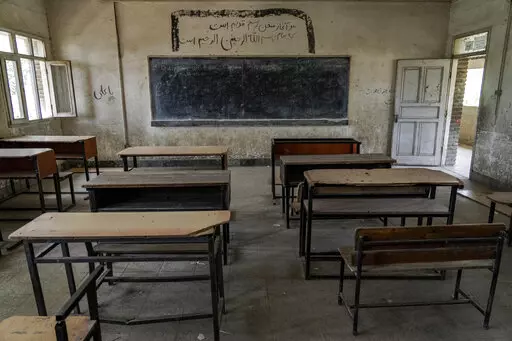 A classroom of a Hazara Shiite school sits empty in Kabul, Afghanistan, Sunday, July 31, 2022. The United Nations on Sunday, Sept. 18, 2022, called for Afghanistan's Taliban rulers to reopen schools to girls in grades 7-12, calling the anniversary of their exclusion from high school “shameful.” (AP Photo/Ebrahim Noroozi, File)