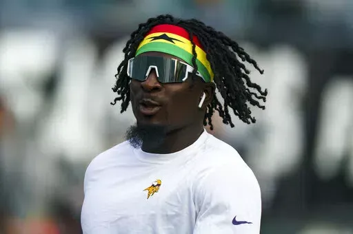 Minnesota Vikings linebacker Brian Asamoah (33) warms up prior to an NFL football game against the Philadelphia Eagles, Monday, Sept. 19, 2022, in Philadelphia. With a steady stream of players continuing to enter the league with African heritage, the NFL has been slowly making inroads on a continent where American football has long been a distinctly foreign sport. (AP Photo/Chris Szagola, File)