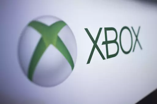 The Xbox logo is pictured at the Paris Games Week in Paris, Nov. 3, 2017. Several exclusive Xbox games will be soon making their way to rival consoles, the video gaming brand and its parent company Microsoft announced Thursday, Feb. 15, 2024. (AP Photo/Kamil Zihnioglu, File)