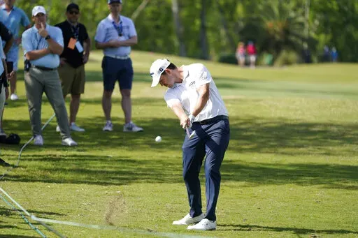 Patrick Cantlay hits off the edge of the 12th fairway during the first round of the PGA Zurich Classic golf tournament at TPC Louisiana in Avondale, La., Thursday, April 21, 2022. (AP Photo/Gerald Herbert)