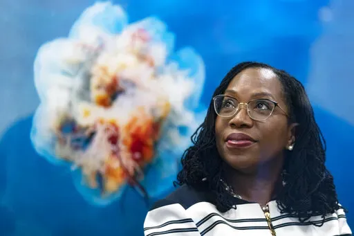 Supreme Court nominee Judge Ketanji Brown Jackson waits to meet with Sen. Sheldon Whitehouse, D-R.I., on Capitol Hill, March 8, 2022, in Washington. Judge Jackson's confirmation hearing starts March 21. If confirmed, she would be the court's first Black female justice. (AP Photo/Alex Brandon, File)
