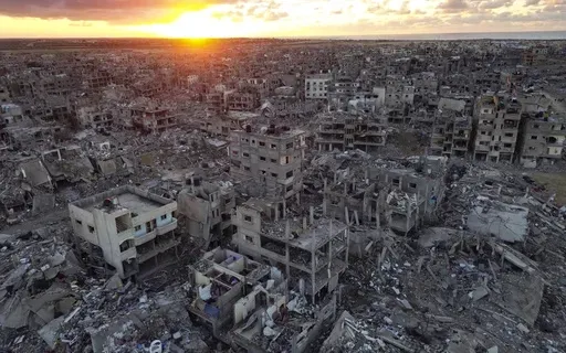 An aerial photograph taken by a drone shows the destruction caused by the Israeli air and ground offensive, in Rafah, Gaza Strip, Friday, Jan. 24, 2025. (AP Photo/Jehad Alshrafi)