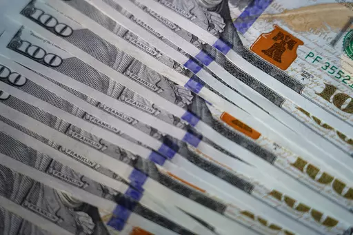 U.S. $100 bills are seen, Thursday, July 14, 2022, in Marple Township, Pa. If you earned a bank sign-up bonus or interest, you need to set aside some of it for taxes. Your tax bracket will determine how much you owe on your earnings, which will be between 10%-37% of the total. Avoid stress during tax season by setting aside earnings in advance. Also, don’t get a bank account simply for the bonus; you’ll want to make sure it has other good features. If you’re thinking about earning multiple