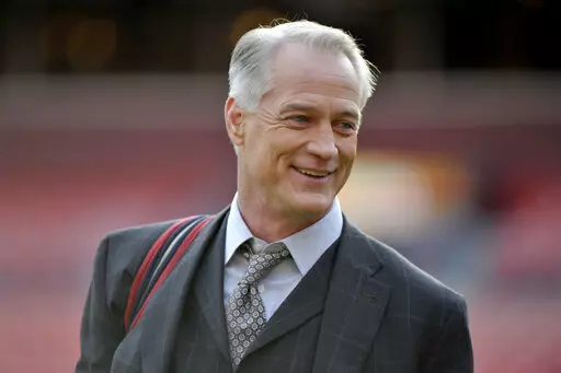 Former Dallas Cowboys standout and longtime NFL on FOX game analyst Daryl Johnston stands on the field prior to an NFL football game between the Philadelphia Eagles and Washington Redskins, on Dec. 30, 2018, in Landover, Md. Johnson is executive vice president of football operations of the USFL. As the league prepares for Sunday night’s championship game between the Birmingham Stallions and Philadelphia Stars at the Pro Football Hall of Fame in Canton, Ohio,  where it goes from here is the big