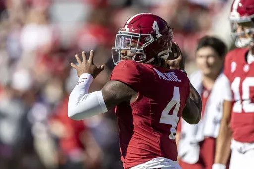 Alabama quarterback Jalen Milroe (4) warms up before an NCAA college football game against Mercer, Saturday, Nov. 16, 2024, in Tuscaloosa, Ala. (AP Photo/Vasha Hunt)