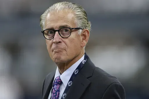 Fox Sports rules analyst Mike Pereira on the sideline before warm ups prior to an NFL football game in Arlington, Texas, Sept. 22, 2024. (AP Photo/Gareth Patterson, File)