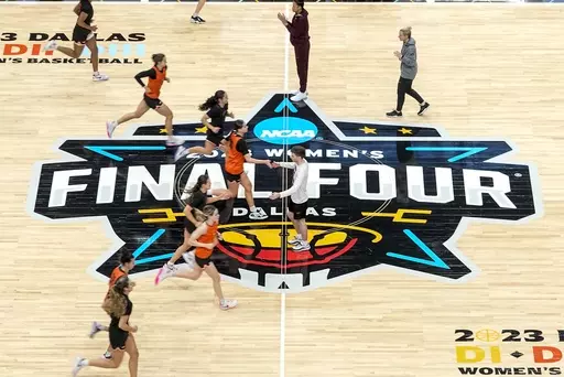 Virginia Tech players run a drill during a practice session for an NCAA Women's Final Four semifinals basketball game Thursday, March 30, 2023, in Dallas. (AP Photo/Darron Cummings)