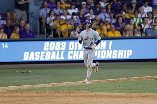 LSU's Dylan Crews reacts after hitting a foul ball during an NCAA college baseball tournament super regional game against Kentucky in Baton Rouge, La., Sunday, June 11, 2023. (AP Photo/Tyler Kaufman)