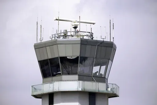 The air traffic control tower stands at Chicago's Midway International Airport, March 12, 2013. (AP Photo/M. Spencer Green, File)