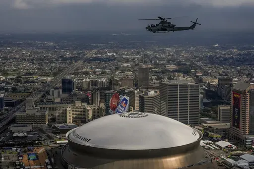 A UH-1Y Venom helicopter from Marine Light Attack Squadron 773 flies over Caesars Superdome ahead of Super Bowl 59 between the Philadelphia Eagles and the Kansas City Chiefs, Saturday, Feb. 8, 2025, in New Orleans. (AP Photo/Julia Demaree Nikhinson)