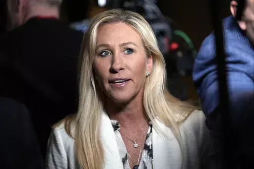 Rep. Marjorie Taylor Greene, R-Ga., arrives for an interview in Laconia, N.H., Jan. 22, 2024. Social media accounts who shield their real identities have come to dominate right-wing political discussion online, even as they spread false information. When a user who uses a pseudonym on the social platform X made a claim against a government website, public figures including Greene immediately started raising alarm. In three days, the claim, which election officials explained was inaccurate, amass