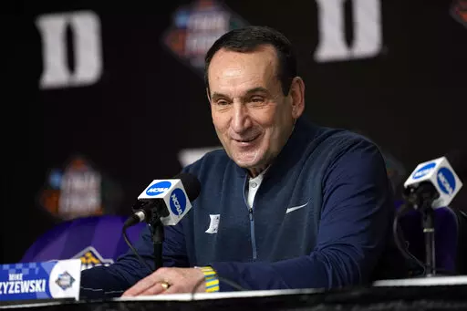 Duke coach Mike Krzyzewski answers a question during a news conference at the men's Final Four NCAA college basketball tournament Thursday, March 31, 2022, in New Orleans. North Carolina will play Duke Saturday. (AP Photo/David J. Phillip)