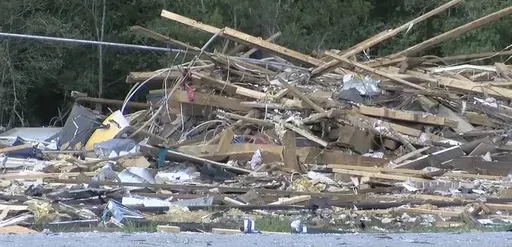 This image made from video provided by KPLC-TV shows debris from a house in Ragley, La., that was destroyed by an explosion, killing a teenage boy from Alabama and injuring other people on Saturday, Aug. 31, 2024. (KPLC-TV via AP)