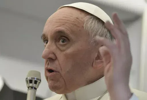In this July 29, 2013 file photo, Pope Francis answers reporters questions during a news conference aboard the papal flight of his famous quip "Who am I to judge?", on the journey back from Brazil. Francis' apology Tuesday, May 28, 2024, for using a vulgar term to refer to gay men was the latest comment to make headlines about the Catholic Church's teachings on homosexuality. Francis has made a hallmark of reaching out to LGBTQ+ Catholics, but his 11-year pontificate has also seen plenty of prob