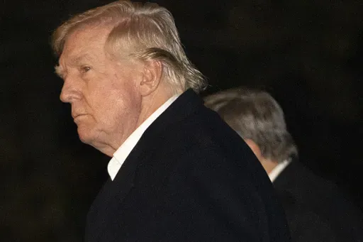 President Donald Trump walks across the South Lawn of the White House, Sunday, March 2, 2025, in Washington, after returning from a trip to Florida. (AP Photo/Mark Schiefelbein)