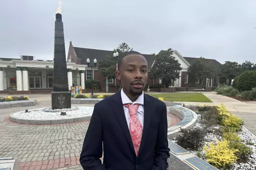 Chad Preston, a senior political science major at Florida AM University, poses for a photo before class on Sept. 27, 2023 in Tallahassee, Fla. A core mission of Florida A&M University from its founding over a century ago has been to educate African Americans. It was written into the law that established the school along with another college, in Gainesville, reserved for white students. At Florida's only public HBCU, some students now fear political constraints might get in the way of teaching pa