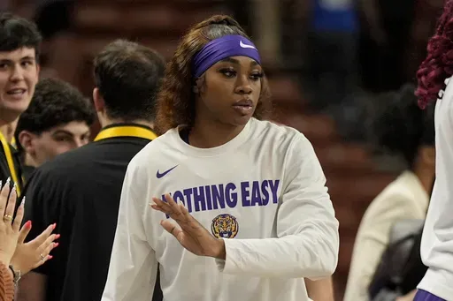 LSU guard Aneesah Morrow walks off the court after an NCAA college basketball game against Texas in the semifinals of the Southeastern Conference tournament, Saturday, March 8, 2025, in Greenville, S.C. Morrow was injured during the second hal.f (AP Photo/Chris Carlson)