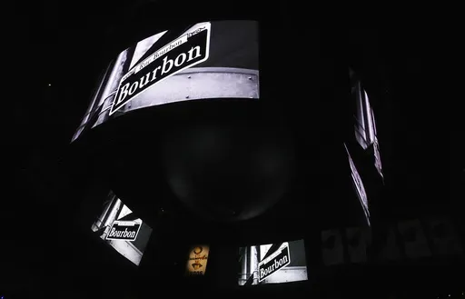 Signage for Bourbon Street is displayed on the scoreboard at the Kaseya Center as a tribute for people killed after a vehicle drove into a crowd in New Orleans before an NBA basketball game between the Miami Heat and the New Orleans Pelicans, Wednesday, Jan. 1, 2025, in Miami. (AP Photo/Lynne Sladky)