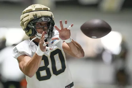 New Orleans Saints tight end Jimmy Graham (80) runs through drills at the NFL team's football training camp in Metairie, La., Friday, Aug. 4, 2023. (AP Photo/Gerald Herbert)