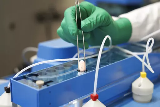 This image provided by Pfizer in October 2021 shows the company's COVID-19 Paxlovid pills. U.S. health regulators on Wednesday, Dec. 22, 2021 authorized the first pill against COVID-19, a Pfizer drug that Americans will be able to take at home to head off the worst effects of the virus. (Pfizer via AP)