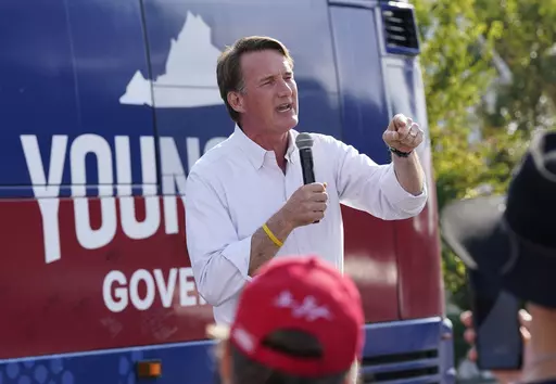 Virginia Gov. Glenn Youngkin addresses the crowd during an early voting rally Sept. 21, 2023, in Petersburg, Va. (AP Photo/Steve Helber, File)
