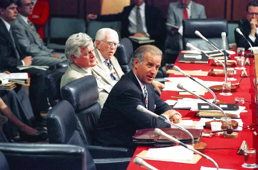 Sen. Joseph Biden, D-Del., chairman of the Senate Judiciary Committee, right, questions Supreme Court nominee Stephen Breyer during Breyer's confirmation hearing on Capitol Hill in Washington, July 14, 1994. Committee members Sen. Edward Kennedy, D-Mass., left, and Sen. Howard Metzenbaum, D-Ohio, look on during the proceeding.  Biden knows better than anyone the unexpected turns a Supreme Court nomination can take after it lands on Capitol Hill. (AP Photo/John Duricka, File)