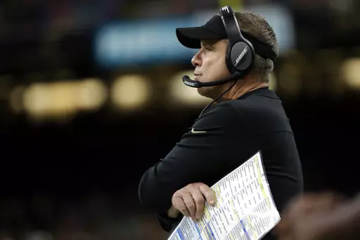 New Orleans Saints coach Sean Payton watches from the sideline during the second half of an NFL football game against the Miami Dolphins Monday, Dec. 27, 2021, in New Orleans. (AP Photo/Derick Hingle)
