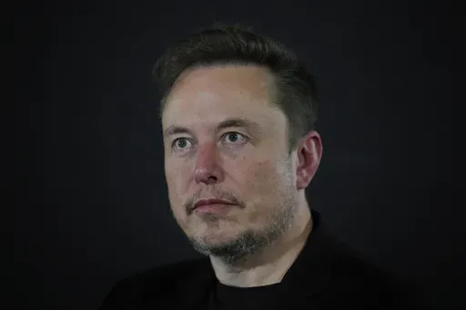 Tesla and SpaceX's CEO Elon Musk looks on, during an in-conversation event with Britain's Prime Minister Rishi Sunak at Lancaster House in London, Thursday, Nov. 2, 2023. Musk, who's been under fire over accusations of antisemitism flourishing on his social media platform X, paid a visit Monday, Nov. 27, 2023 to Israel, where he toured a kibbutz that was attacked last month by Hamas militants and was set to meet with top leaders. (AP Photo/Kirsty Wigglesworth, Pool, File)