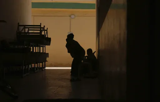 A Yazidi returnee family lives inside a school since they are unable to afford to rebuild their damaged house in the village of Hardan in Sinjar, Iraq, Wednesday, July 17, 2024. (AP Photo/Farid Abdulwahed)