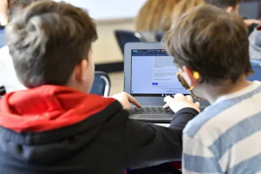 Students work on a laptop computer at Stonewall Elementary in Lexington, Ky., Feb. 6, 2023. A bill aiming to protect kids from the harms of social media, gaming sites and other online platforms appears to have enough bipartisan support to pass, though whether it actually will remains uncertain. (AP Photo/Timothy D. Easley, File)