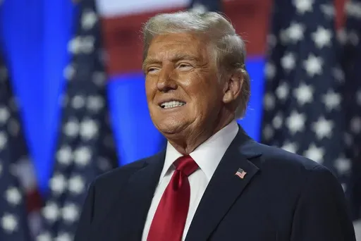 Then-Republican presidential nominee former President Donald Trump smiles at an election night watch party at the Palm Beach Convention Center, Nov. 6, 2024, in West Palm Beach, Fla. (AP Photo/Evan Vucci, File)