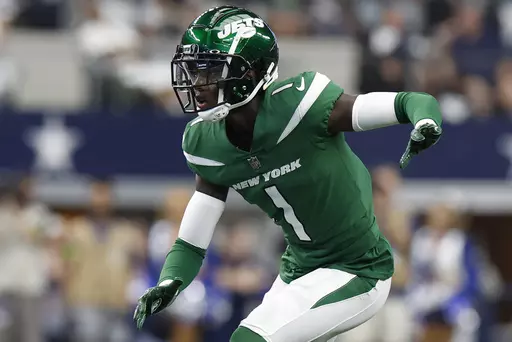 New York Jets defensive back Sauce Gardner (1) looks to defend during an NFL football game against the Dallas Cowboys on Sunday, Sept. 17, 2023, in Arlington, Texas. Gardner was voted the No. 1 cornerback at the midpoint of the season by The Associated Press.(AP Photo/Matt Patterson, File)