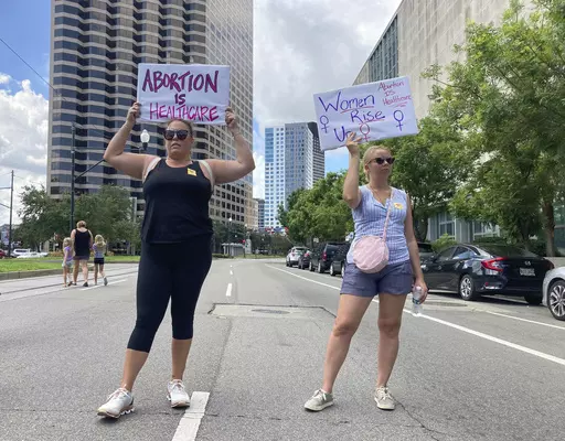 Protesters wave signs and demonstrate in support of abortion access in front of a New Orleans courthouse, July 8, 2022. Republican lawmakers in Louisiana rejected legislation Wednesday, May 10, 2023, that would add exceptions in cases of rape and incest to one of the strictest abortion bans in the country. (AP Photo/Rebecca Santana, File)