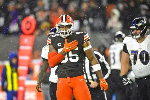 Cleveland Browns defensive end Myles Garrett celebrates after sacking Baltimore Ravens quarterback Tyler Huntley during the second half of an NFL football game, Saturday, Dec. 17, 2022, in Cleveland. (AP Photo/David Richard)