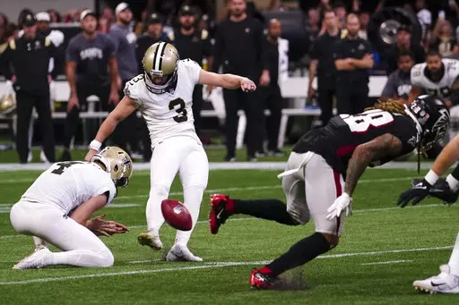 during the second half of an NFL football game, Sunday, Sept. 11, 2022, in Atlanta. The New Orleans Saints won 27-26. (AP Photo/John Bazemore)
