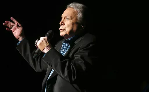 Country music legend Mickey Gilley, 80, performs at Shenandoah University in Winchester, Va. to benefit the Shenandoah Valley Battlefields National Historic District, Saturday, Jan. 14, 2017. Gilley, whose namesake Texas honky-tonk inspired the 1980 film “Urban Cowboy,” and a nationwide wave of Western-themed nightspots, died Saturday, May 7, 2022, at age 86. ( Jeff Taylor/The Winchester Star via AP, File)