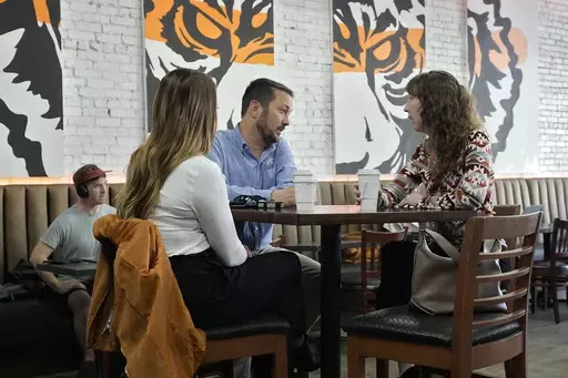 Customers drink coffee at the Blind Tiger Cafe Jan. 10, 2024, in Tampa, Fla. On Wednesday, April 10, 2024, the Labor Department issues its report on inflation at the consumer level in March. (AP Photo/Chris O'Meara, File)