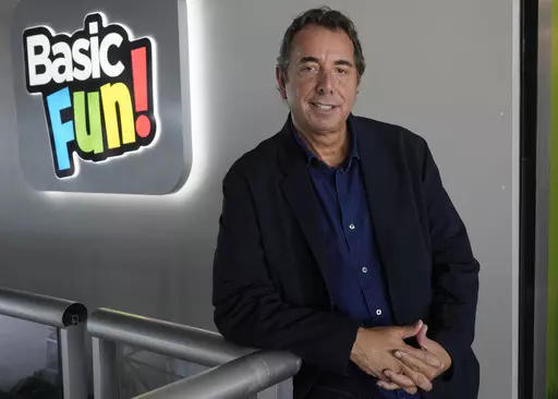 Jay Foreman, CEO of Basic Fun!, stands near the entrance to his toy company, Thursday, April 6, 2023, in Boca Raton, Fla. Foreman had to temporarily scuttle plans for an acquisition due to the credit crunch. (AP Photo/Marta Lavandier)