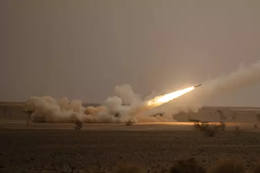 A launch truck fires the High Mobility Artillery Rocket System (HIMARS) at its intended target during the African Lion military exercise in Grier Labouihi complex, southern Morocco, on June 9, 2021. U.S. leaders from President Joe Biden on down are being careful not to declare a premature victory, after a Ukrainian offensive forced Russian troops into a messy retreat in the north. Lawmakers particularly pointed to the precision weapons and rocket systems that the U.S. and Western nations have pr