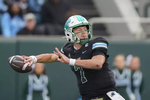 Tulane quarterback Michael Pratt (7) passes in the first half of an NCAA college football game against UTSA in New Orleans, Friday, Nov. 24, 2023. (AP Photo/Gerald Herbert)