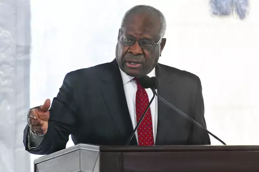 Supreme Court Justice Clarence Thomas delivers a keynote speech during a dedication of Georgia new Nathan Deal Judicial Center in Atlanta, Feb. 11, 2020. Reports that the wife of Thomas implored Donald Trump’s White House chief of staff to act to overturn the 2020 election results has put a spotlight on how justices decide whether to step aside from a case. (AP Photo/John Amis, File)