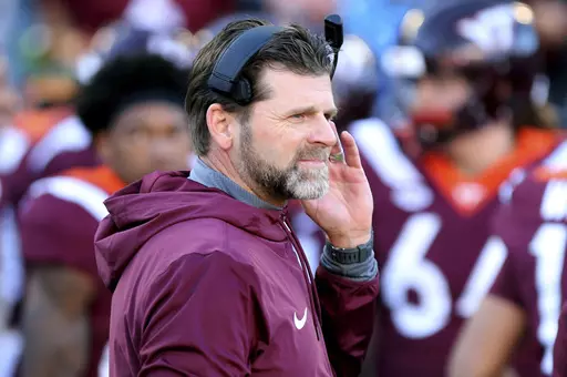 Virginia Tech head coach Brent Pry stands on the sideline prior to an NCAA college football game against North Carolina State, Nov. 18 2023, in Blacksburg, Va. Tulane and Virginia Tech meet Wednesday, Dec. 27, 2023, in Annapolis, Md., for the Military Bowl. The game will take place at Navy's home stadium, and although Tulane is in the same conference as the Midshipmen, the Green Wave haven't played there since 2019. (Matt Gentry/The Roanoke Times via AP, File)