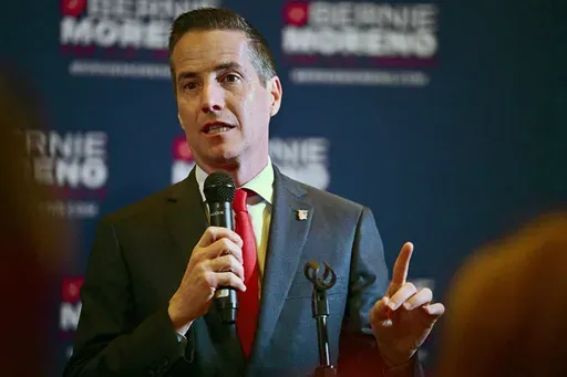Cleveland businessman Bernie Moreno, a Republican candidate for U.S. Senate, speaks to supporters during his primary election night watch party in Westlake, Ohio, March 19, 2024. Moreno likes to portray himself as a political outsider in his race against Democratic Sen. Sherrod Brown. But while his personal backstory may only be emerging in his home state, his close-knit family’s wealth and influence are well-documented elsewhere. (AP Photo/David Dermer, File)
