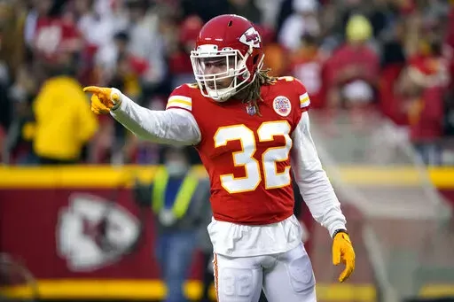 Kansas City Chiefs free safety Tyrann Mathieu (32) points during the first half of an NFL football game against the Pittsburgh Steelers on Dec. 26, 2021, in Kansas City, Mo. The New Orleans Saints and Mathieu have agreed to a three-year, $33 million contract, reuniting the All-Pro safety with his hometown team, a person familiar with the terms told The Associated Press on Tuesday, May 3, 2022.  (AP Photo/Ed Zurga, File)